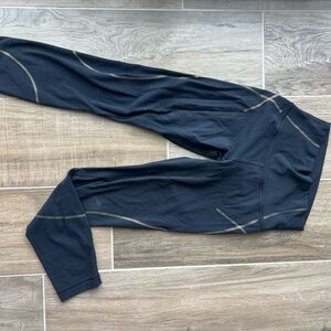 Lululemon Black Leggings with Gold Stitching